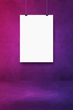 White poster hanging on a purple wall with clips