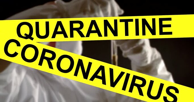 black words QUARANTIN CORONAVIRUS appear on yellow stripes. in the background, a man in a protective mask on face, overalls and gloves takes a sample with a pipette from a test tube