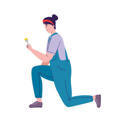 woman in overalls and brush