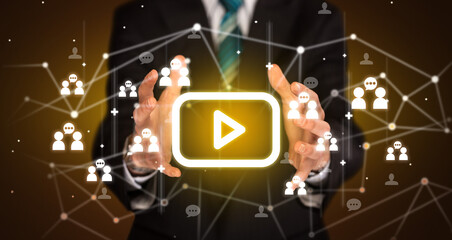 Hand holding social media icons