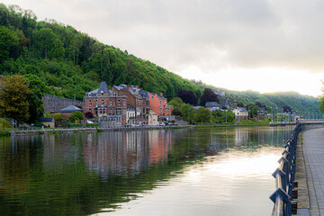 Fototapeta na wymiar Toeristic pictures of the city Dinant togheter with the River Meuse or Maas. Beautifull clouds, sunsets or blue hours with reflections on the water. Belgium Ardennes toeristic topshots.