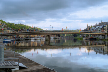 Toeristic pictures of the city Dinant togheter with the River Meuse or Maas.  Beautifull clouds, sunsets or blue hours with reflections on the water.  Belgium Ardennes toeristic topshots.
