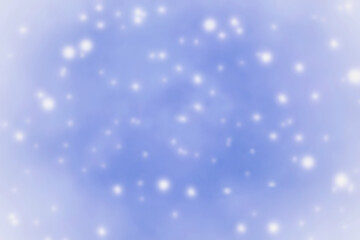 Fototapeta na wymiar Abstract soft blurred blue and white snowfall background. The concept of Christmas, New Year, and all celebrations backgrounds.