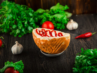 Hotdog with meat and sauce