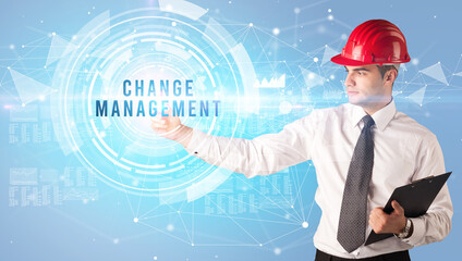 Handsome businessman with helmet drawing