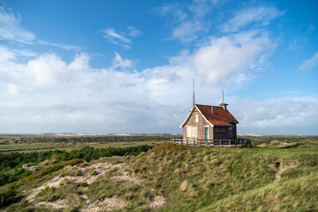 Cabin overseeing sunny seaside valley