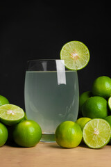Limeade (juice) with fresh lime decoration - 448426978