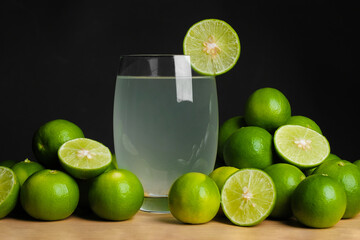 Limeade (juice) with fresh lime decoration - 448426981