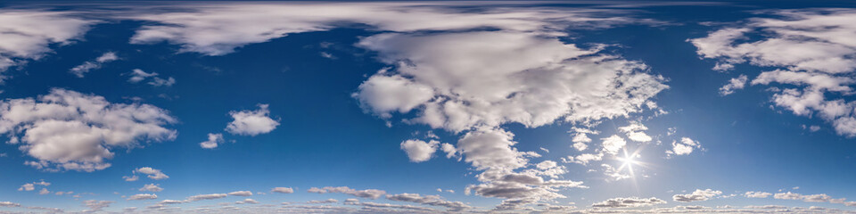 Obraz premium blue sky with white beautiful clouds. Seamless hdri panorama 360 degrees angle view with zenith for use in 3d graphics or game development as sky dome or edit drone shot