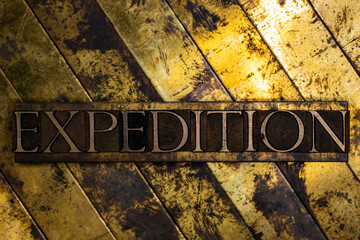 Expedition text on vintage textured copper and gold background