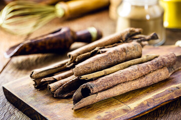 Organic, raw, preservative-free and natural cinnamon sticks, rustic cuisine, healthy food