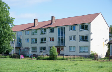 Fototapeta na wymiar Derelict council house in poor housing estate slum with many social welfare issues in Port Glasgow