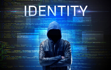 Faceless hacker on code background