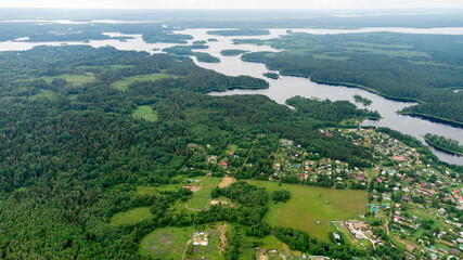 Obraz premium Lake Seliger is a large system of lakes linked by effluents, has many small islands and is surrounded by forests. It is one of the biggest natural lakes of Central Russia.