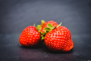 Strawberries on black background