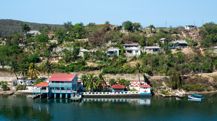 Fototapeta na wymiar Santiago de Cuba boat station and some living houses