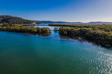 Obraz premium Morning aerial waterscape over the channel with clear skies