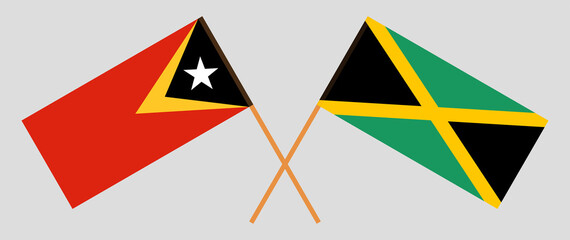 Crossed flags of East Timor and Jamaica. Official colors. Correct proportion