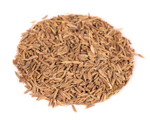Caraway seeds isolated on white background. Pile of cumin or caraway spice.