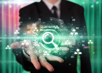 Businessman holding technology icon concept