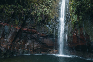Fototapeta na wymiar 25 Fontes Falls at the end of Levada das 25 Fontes. Madeira, Portugal. High quality photo