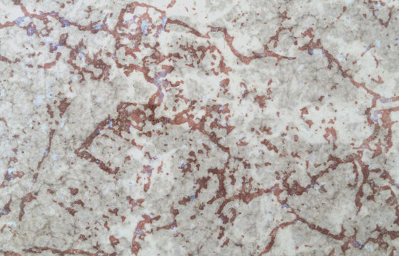 Textura de superf&iacute;cie gasta, envelhecida, rugosa com cores de vermelhos, cinzento e branco, parecido com marmore