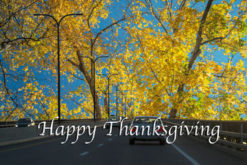 Text of Happy Thanksgiving on a fall background