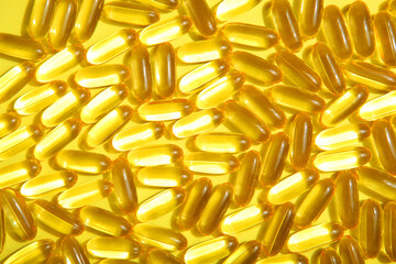 Omega 3 capsules close up. Fish fat. Background 