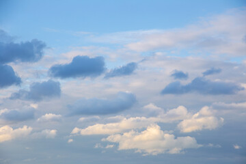 evening sky with clouds and rays of the sun, background