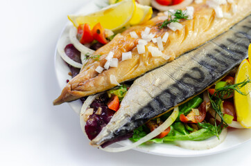 Hot smoked scottish mackerel fillets with onions, tomato and salad