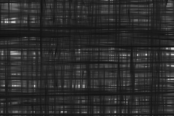 Black and white pattern of abstract graphic lines.