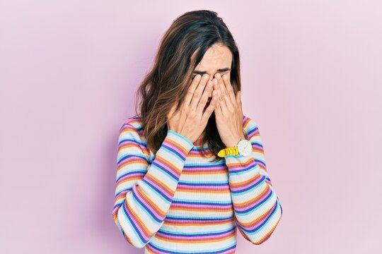 Young hispanic girl wearing casual clothes rubbing eyes for fatigue and headache, sleepy and tired expression. vision problem