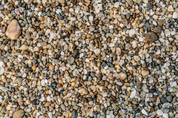 The texture of coarse sand near. Macro.