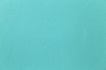 Light green texture cement wall background.