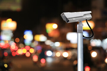 CCTV system on blur road at night background.