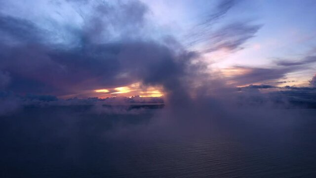 Sunset inside clouds over pavon bay osa peninsula aerial Costa Rica