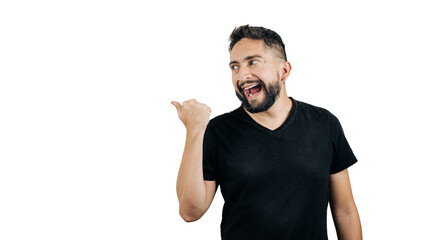 man in black shirt smiling pointing to something on the side, white background