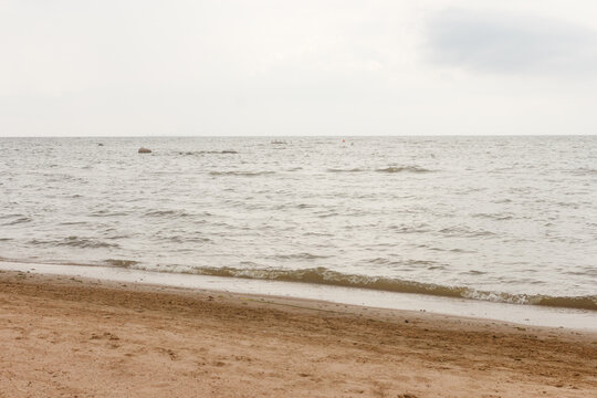 Cloudy Day At Baltic Sea Coast At Komarovo Village Near Saint Petersburg, Russia. Sandy Shore.