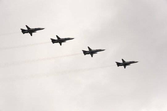 Modernized front-line bombers with a variable sweep wing Su-24M in the sky over Moscow's Red Square during the Victory Air Parade