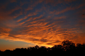 Stratocumulus and Cirrus cloud sunset