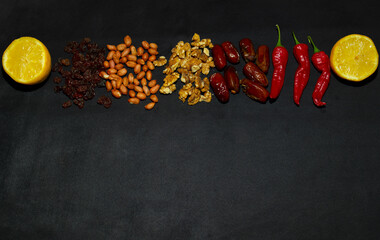 many different ingredients on a dark background