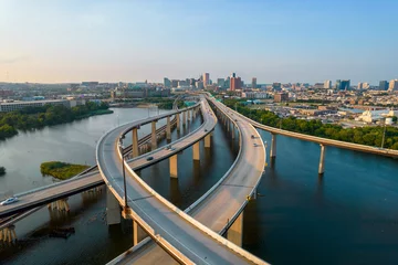 Fotobehang Aerial View of Crossing Highways Leading into Baltimore City at Sunset © suraju