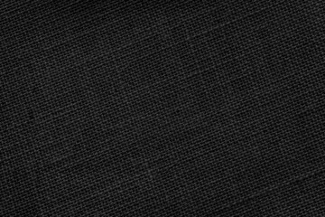 Black fabric texture in oblique angle background