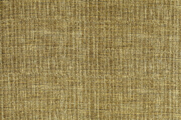 The texture of natural coarse burlap. Natural fabric with a clear interweaving of threads. Abstract rough background.