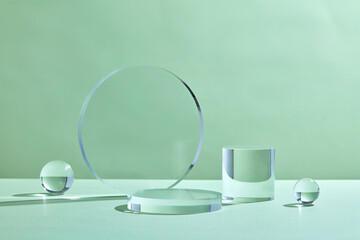 Glass podium minimal studio on green background. Abstract geometric shape object illustration....