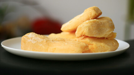 Fermented cassava or tape singkong on white plate. 