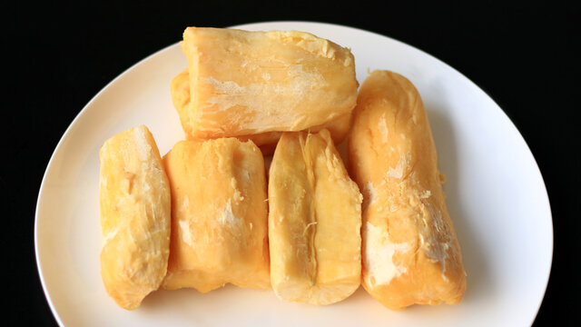 Fermented cassava or tape singkong on white plate. 