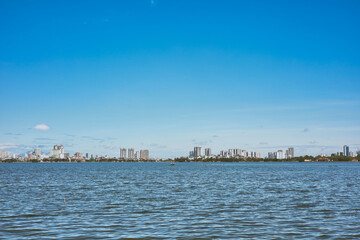 A lake view in the city on daytime