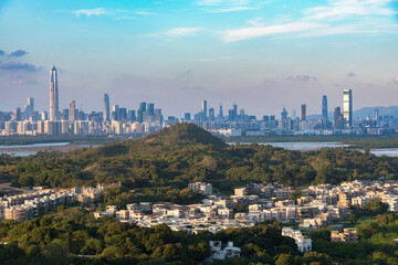 Fototapeta premium Skyline of downtown district of Shenzhen city, China at night. Viewed from Hong Kong border