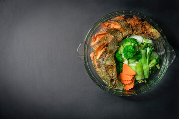 Snake Head fish deep-fried with mixed herb vegetable carrot, broccoli